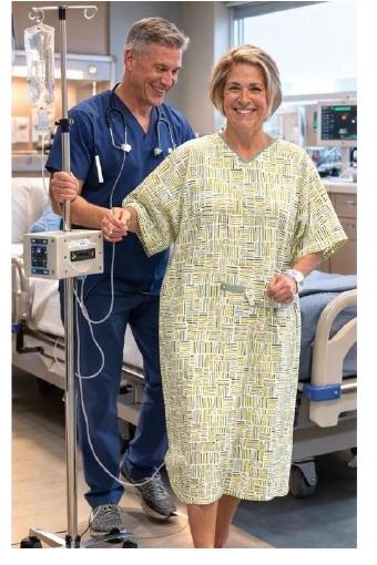 Patient wearing Every1Gown with clinician